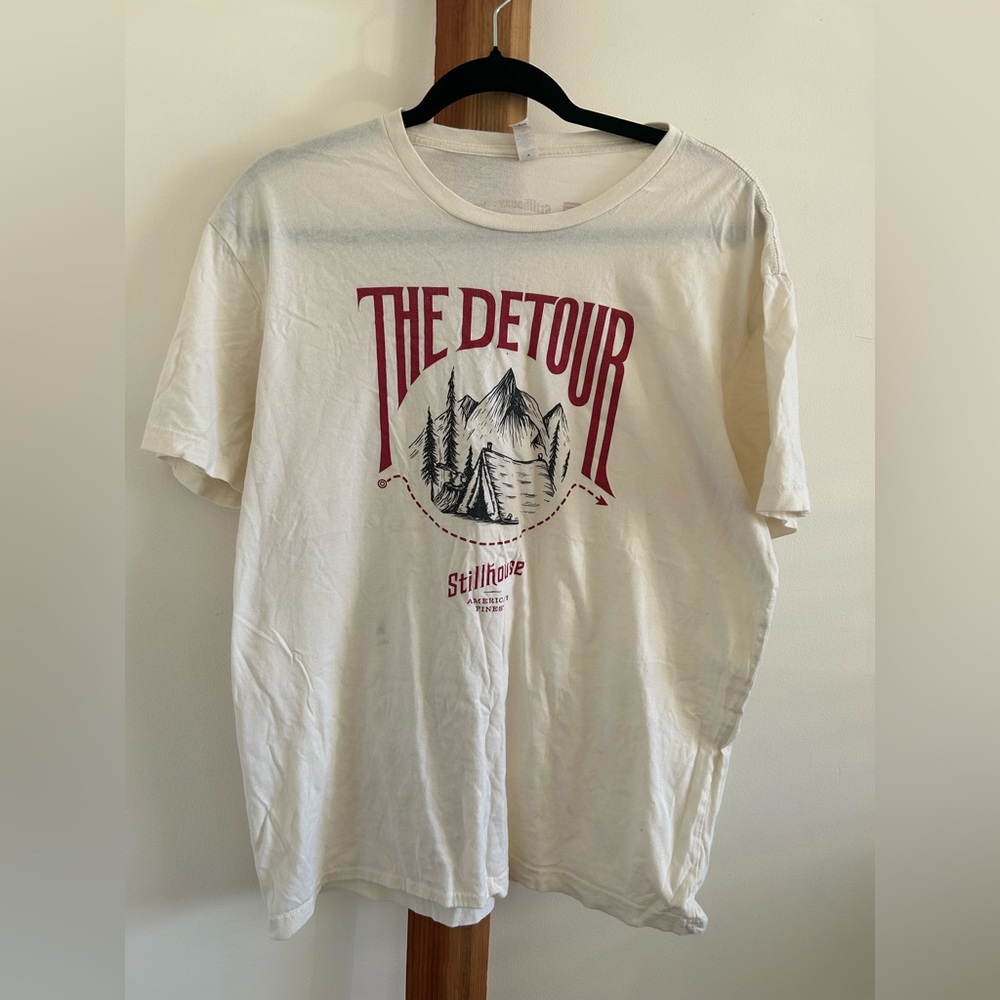 Next Level Apparel Stillhouse The Detour Cotton Cream Graphic Tee